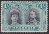 RHODESIA 1910 1/- DOUBLE HEAD UNMOUNTED MINT SG 151  #1143